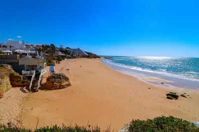 a view of a beach with the ocean at Santa Eulalia Mar in Albufeira