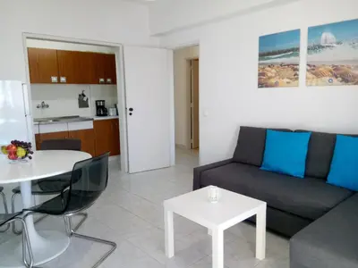 a living room with a couch and a table at TORRE 14 Vista Magnifica in Quarteira