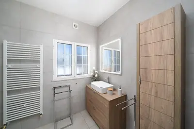 a bathroom with a sink and a window at Exclusive Villa Toulouse with pool in Falesia Algarve in Albufeira