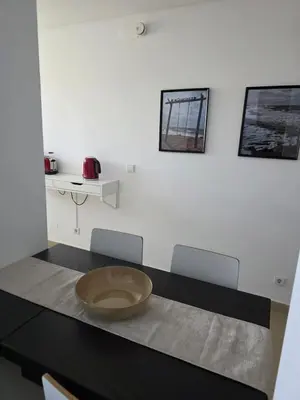 a room with a table with a bowl on it at Cavalo Preto Luxury Beach Resort - C201 in Quarteira
