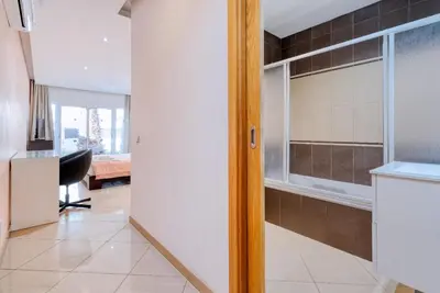 a kitchen with a large window in a room at Full private 300sqm Villa Jacuzzi Heated Pool Ideal & quiet location in Albufeira