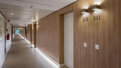 a hallway of a building with a number on the wall at Quinta do Lago Country Club in Quinta do Lago