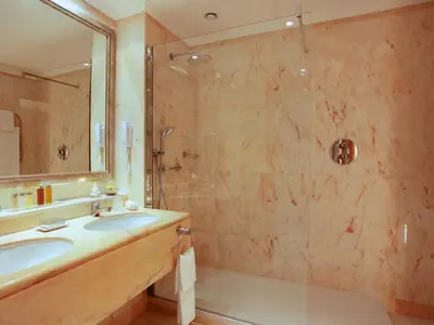 a bathroom with a sink and a shower at Hotel Quinta do Lago in Quinta do Lago