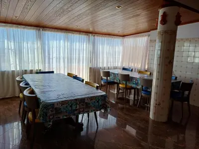 a dining room with a table and chairs at Villa Ramos in Albufeira