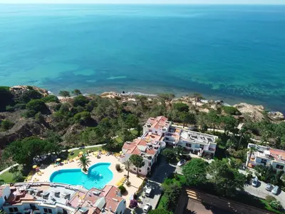 an aerial view of a resort and the ocean at Alfagar Village in Albufeira