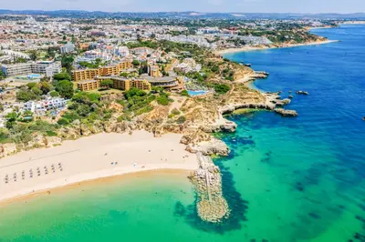 an aerial view of a beach and the ocean at Auramar Beach Resort in Albufeira