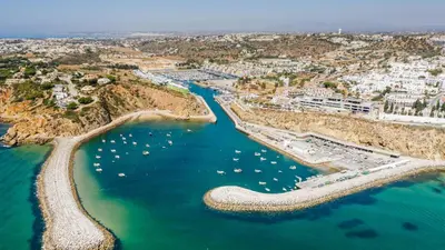 an aerial view of a harbor with boats in the water at Hotel Sol e Mar Albufeira - Adults Only in Albufeira