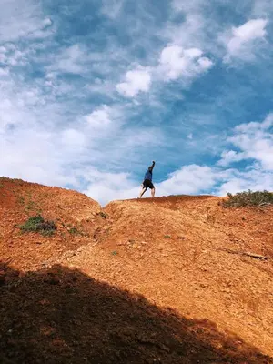 a person walking on top of a hill at Quinta Pedra Dos Bicos in Albufeira