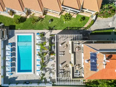 an overhead view of a resort with a swimming pool at Apartamentos Turisticos Novochoro in Albufeira
