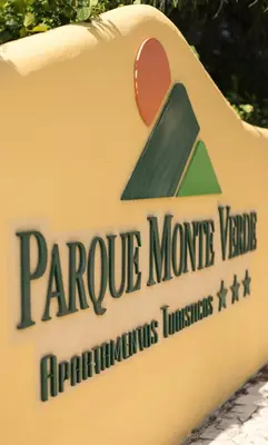 a sign for aorge moore ventures headquarters at Parque Monte Verde in Albufeira