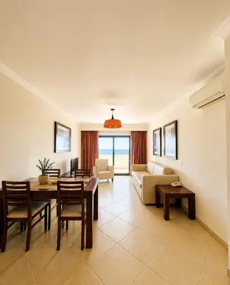 a living room with a couch and a table at Cerro Mar Atlantico & Cerro Mar Garden in Albufeira