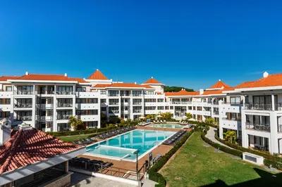 an aerial view of a resort with a swimming pool at As Cascatas Golf Resort & Spa in Vilamoura