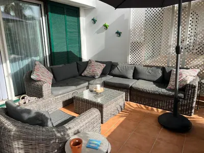 a white kitchen with white cabinets and appliances at Vila Sol, Apartment 468 in Quarteira