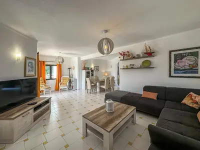 a living room with a couch and a table at V3, Villa Belo Horizonte near Beach, Albufeira in Albufeira