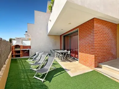a house with a balcony and a swimming pool at V4, Villa Jardins Branqueira4 near Beach, Albufeira in Albufeira