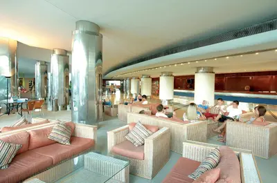 a large shopping mall with a lot of stores at Hotel Apartamento Paraiso De Albufeira in Albufeira