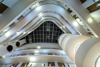 a large building with a vaulted ceiling at Aqua Pedra Dos Bicos Design Beach Hotel - Adults Friendly in Albufeira
