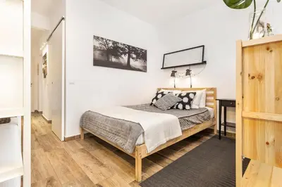a bedroom with a bed in a room at Modern Pool Apartment, Vilamoura in Quarteira