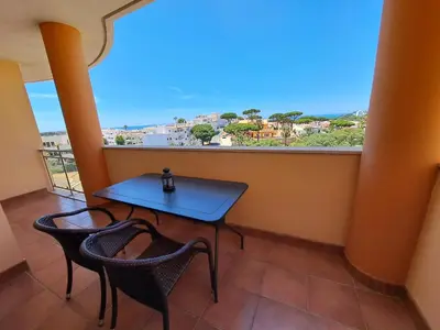 a bathroom with a shower and a sink and a shower at Charming Ocean View Apartment in Albufeira