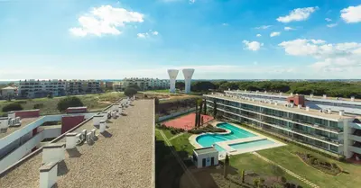 arial view of a hotel with a swimming pool at Residence Golf Club by Garvetur in Vilamoura