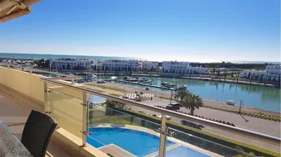 a balcony with a view of a river and a city at Aquamar Sea View - Clever Details in Vilamoura