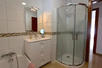 a bathroom with a shower and a sink at Villa Caroline 3 - Clever Details in Vilamoura
