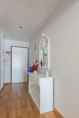a bathroom with a white counter and a mirror at SeaShell Apartment by Atlantic Places in Albufeira