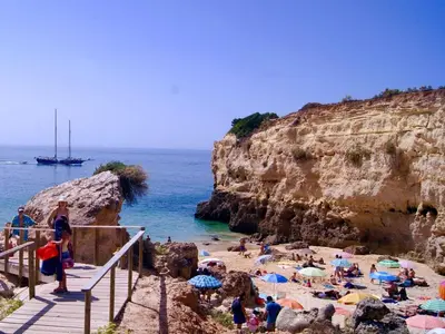 a group of people on a beach near the ocean at Seastar in Vilamoura