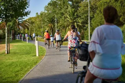 a group of people riding bikes down a sidewalk at Marina Vilamoura - Aquamar 209 - By Vilamoura Sun in Vilamoura