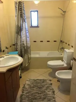 a bathroom with a toilet and a sink and a shower at Excelente T1 Oura Beach Bicos Apartment Lucia in Albufeira