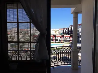 a view of a balcony with a view of a building at Excelente T1 Oura Beach Bicos Apartment Lucia in Albufeira