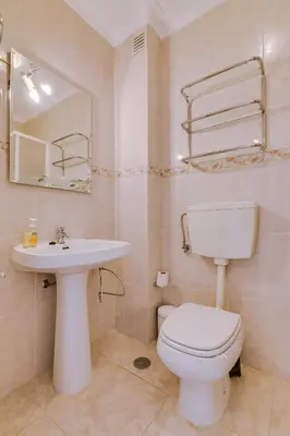 a bathroom with a white toilet and a sink at Ribas - Cozy 2 bedroom apartment - Vilamoura in Vilamoura