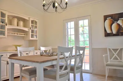 a hallway of a home with a wooden floor at Fantastic for Family Gatherings, Optional Pool Heating, Free Air Con Wifi in Quarteira