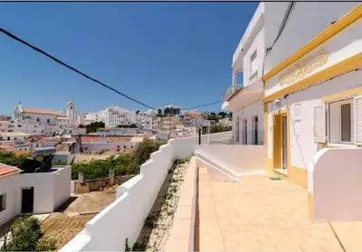 a view of the city from the balcony of a house at ★Traditional House★Heart of Oldtown★ Amazing views in Albufeira
