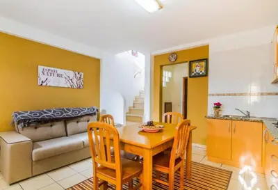 a living room with a table and chairs and a couch at ★Traditional House★Heart of Oldtown★ Amazing views in Albufeira