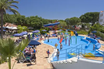 a group of people at a water park at Alfagar Aparthotel in Albufeira