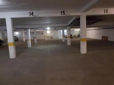 a parking lot with columns and numbers on the ceiling at Apartment Sea View 20m to beach - TOP Quarteira ALGARVE in Quarteira