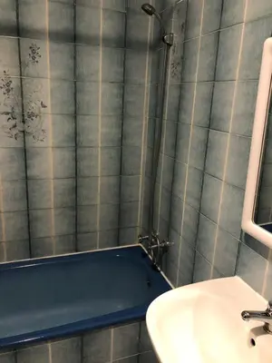 a bathroom with a sink and a bath tub at Apartment Sea View 20m to beach - TOP Quarteira ALGARVE in Quarteira