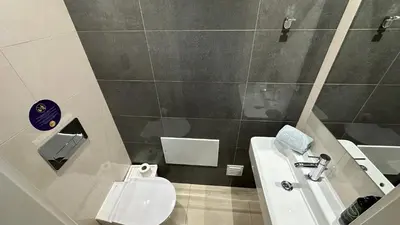 a small bathroom with a toilet and a sink at Albuhera - Private Pool - 8 Pax - Albufeira in Albufeira