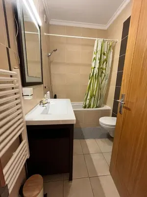 a bathroom with a sink and a toilet and a mirror at Rockfield 4 in Albufeira