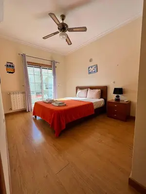 a bedroom with a bed and a ceiling fan at Rockfield 4 in Albufeira