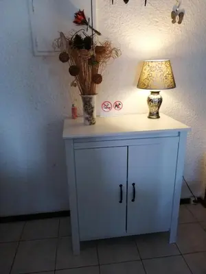 a kitchen with a table and a counter top at Charming Apartment in Quarteira - 50 sqm - Balcony with View in Quarteira