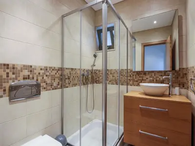a bathroom with a shower and a sink at V3, Villa Jardins Branqueira6 near Beach, Albufeira in Albufeira