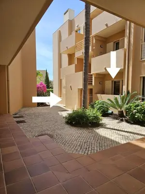 a view of a building from the courtyard at Citadela I, Golfe, Pool and Falesia Beach in Vilamoura