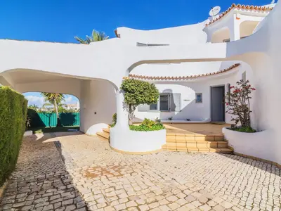 a white house with a courtyard and a driveway at Villa Arribas Villa by Interhome in Patroves