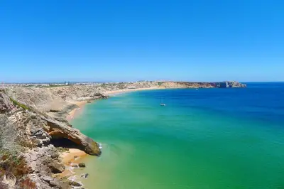 an aerial view of a beach with blue water at Welcoming apartment in Albufeira 80 m² with shared pool in Albufeira