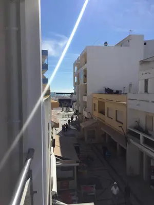 an overhead view of a city street with buildings at Apt 2 Quartos, BBQ, AC, Varanda, Prestige For Home in Quarteira