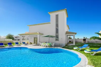 a swimming pool in front of a villa at Casa Ferrero in Guia