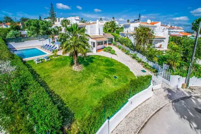 an aerial view of a house with a yard at Villa Miramar in Albufeira