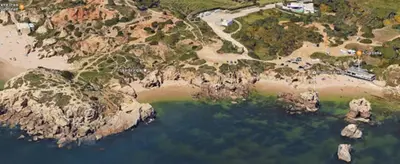an aerial view of a beach with rocks and water at Villa Oceano in Albufeira